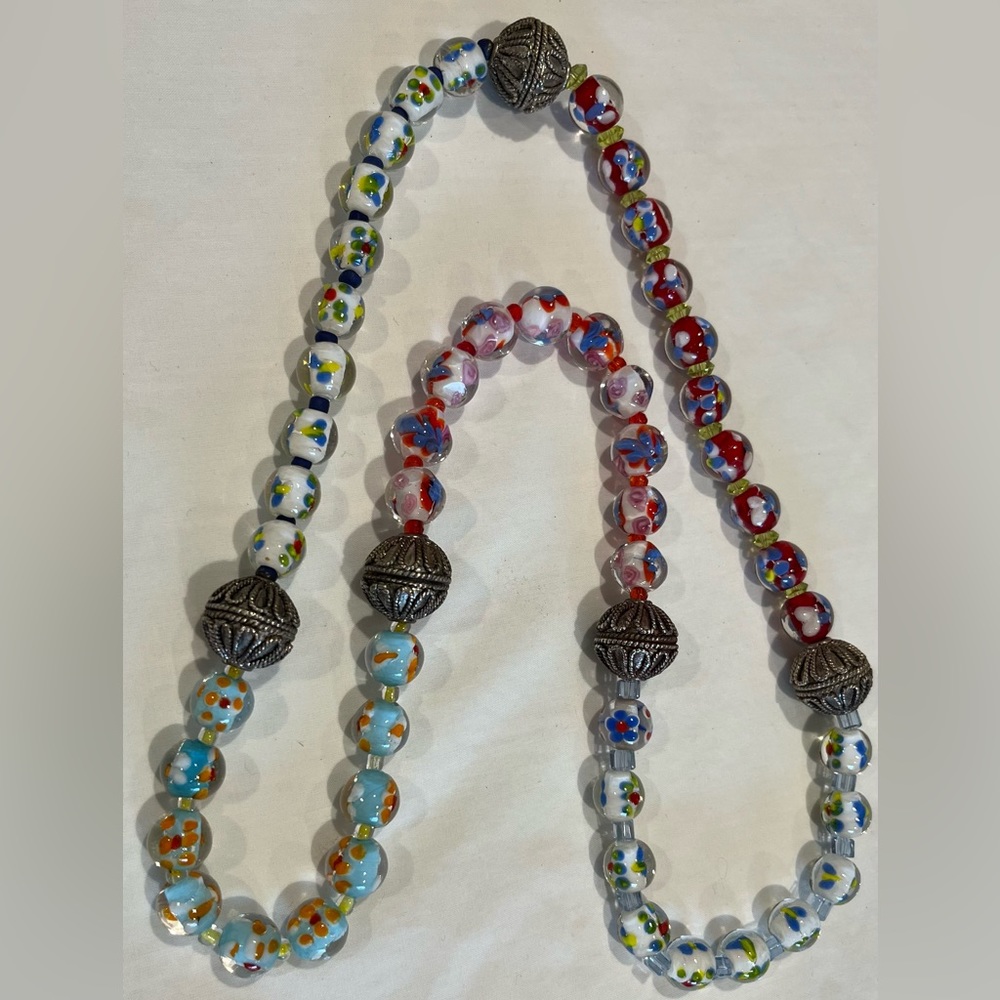 Glass and silver bead necklace. No clasp.